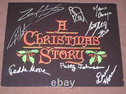 A CHRISTMAS STORY PHOTO AUTOGRAPHED BY 8 CAST MEMBERS WithCOA