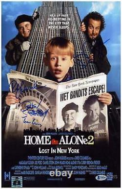 Home Alone 2 Cast Signed 11x17 Photograph Autographed Beckett COA