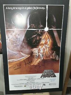 Star Wars Cast Signed Movie Poster Celebrity Authentics COA Carrie Fisher H Ford