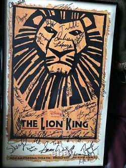 THE ORIGINAL CAST OF THE SHOW THE LION KING SIGNED AND FRAMED APPROX 22 x 14