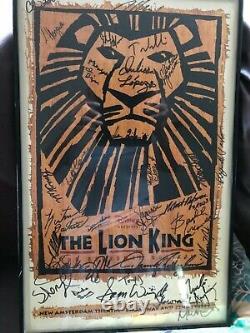 THE ORIGINAL CAST OF THE SHOW THE LION KING SIGNED AND FRAMED APPROX 22 x 14