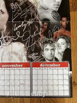 TWILIGHT SAGA cast signed Movie Poster. Kristen Stewart & Robert Pattinson