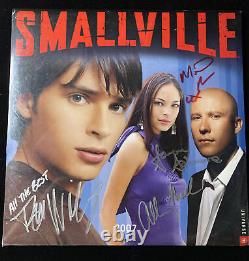 Calendrier 12x12 signé par le casting de Smallville : Welling, Rosenbaum, Mack, + JSA XX87049