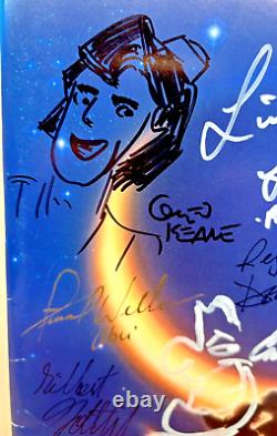 Communiqué de presse du film Aladdin de Disney avec la distribution signée par 17 autographes de Robin Williams