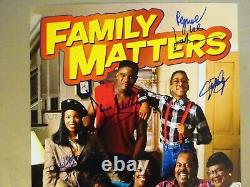 Le titre en français serait: 'Photo de 11x17 signée par le casting de Family Matters, avec preuve d'authenticité JSA COA'