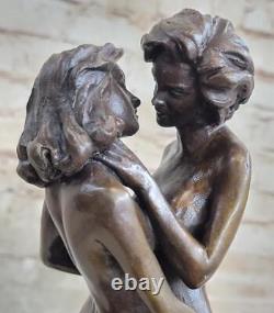 Sculpture en bronze abstraite signée d'un couple en fusion, moulée à chaud, unique et authentique, pour la décoration de votre intérieur.