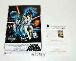 Star Wars Episode IV Un nouvel espoir Affiche du film signée par le casting Coa X5 Beckett Coa Bas