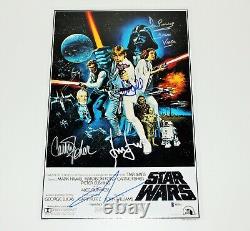 Star Wars Episode IV Un nouvel espoir Affiche du film signée par le casting Coa X5 Beckett Coa Bas